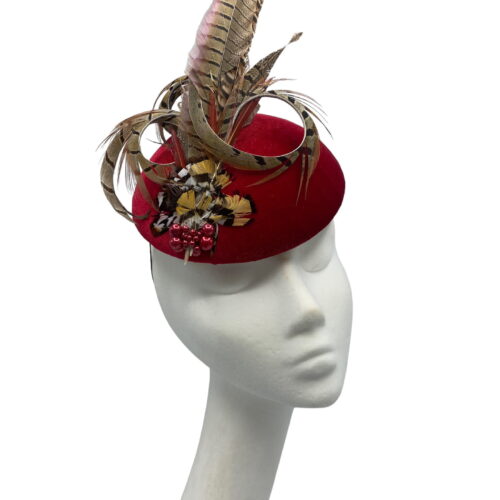 Red velvet feathered headpiece.